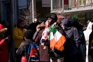 The Black boy with Irish Flags